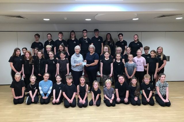 Liz Pike receives a cheque from the Castaway Theatre Group for the YCAA